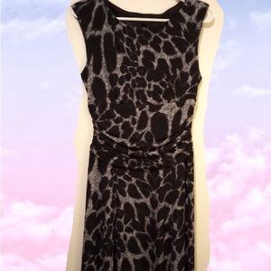 Size 10 Women’s MIDI dress. Excellent condition. Fun black and grey print.